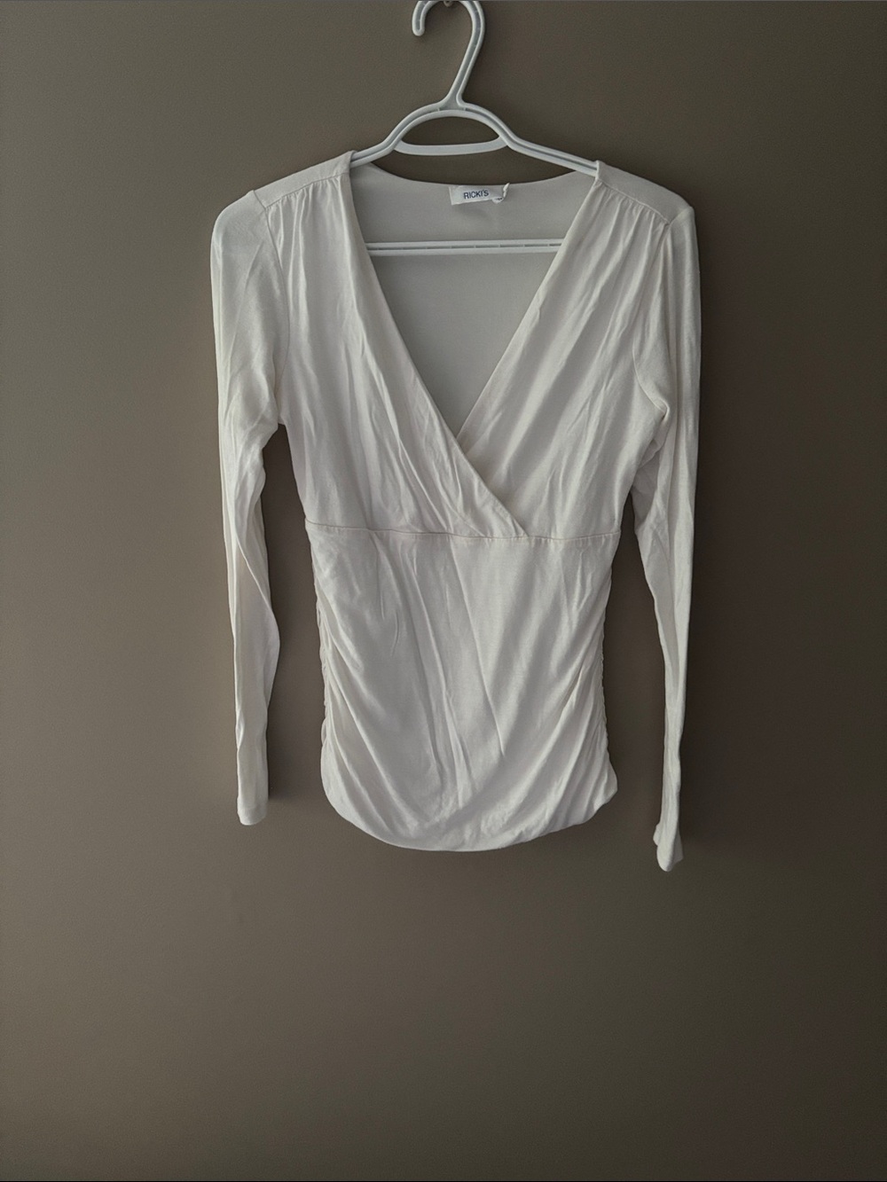 Ricki's Cream Surplice Long Sleeve Top